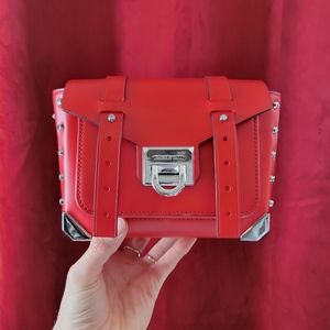 Red Michael Kors Manhattan bag.